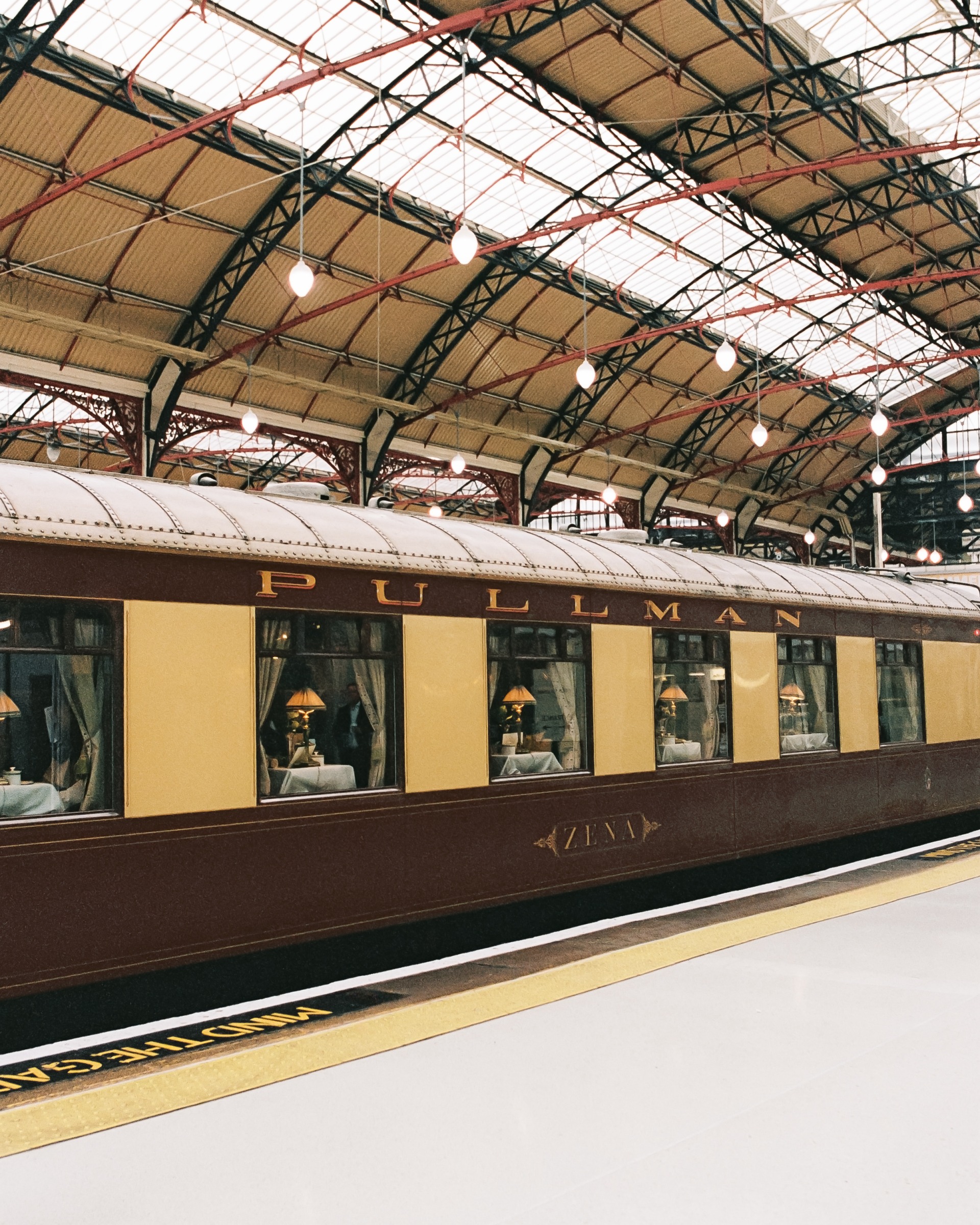 Belmond British Pullman luxury train parked at London Victoria Station platform