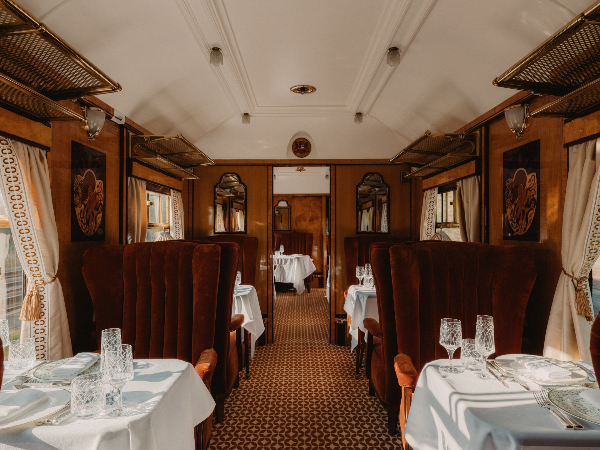 The interior on the Belmond British Pullman featuring polished wood paneling